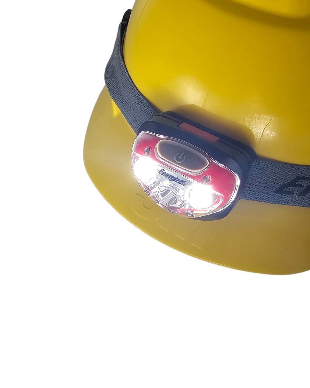 Energizer Headlamp HDBIN32EB flood light setting with headlamp attached to yellow construction hard hat