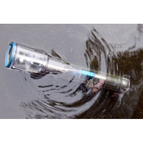 NightStar Shake Flashlight Float ing on surface of a lake.