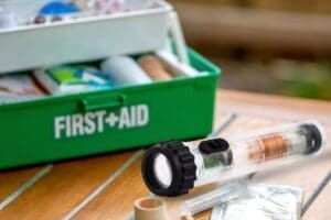 Emergency shake flashlight with first aid kit.
